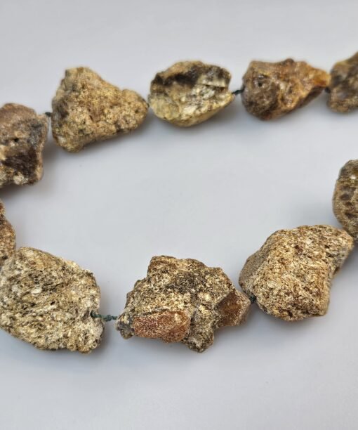 Gintariniai karoliai gydomieji skydliaukės karoliai