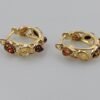 Gold hoop earrings with baltic amber